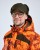 Zielona czapka Pinewood Smaland Teddy Winter 1219 na modelu z nausznikami zapiętymi nad głową