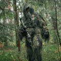 131683_Stroj-maskujacy-Mil-Tec-Ghillie-Suit-Anti-Fire-w-terenie.jpg